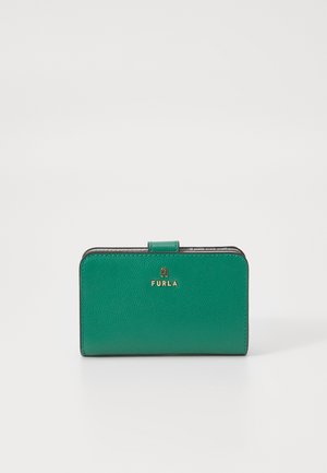 Green leather wallet with a textured finish, gold hardware featuring "FURLA" branding, and a folded closure. Compact rectangular shape.