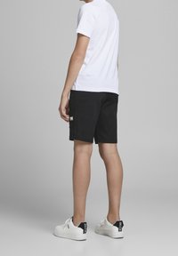 Jack & Jones Junior JJIAIR - Teplákové kalhoty - black