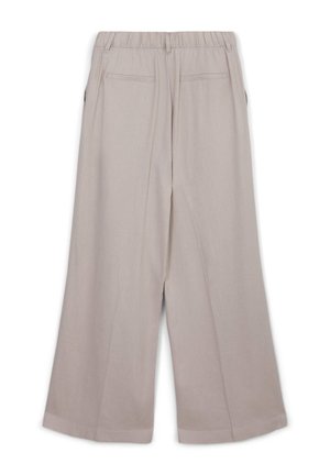 Beige, weit geschnittene Hose mit elastischem Bund, zwei Gesäßtaschen und einem glatten, strukturierten Stoff. Flacher Saum am unteren Ende.