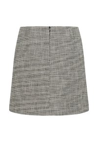 En svart och vit houndstooth-minikjol med strukturerad form, som har en dold dragkedja bak och textilmaterial.