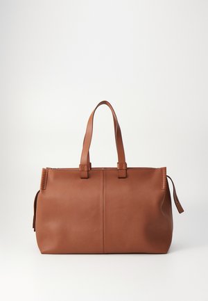 Brown leather tote bag with dual handles, smooth texture, rectangular shape, distinct stitching, and side accent with a zipper detail.