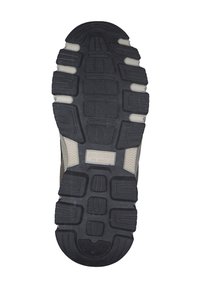 Black rubber outsole with textured grip patterns, featuring a mix of smooth and ridged sections; includes a beige midsole with brand logo.