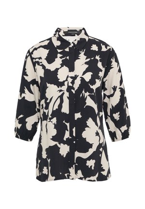 Black and white floral blouse, button-up design, long sleeves with elastic cuffs, lightweight fabric, bold floral pattern.