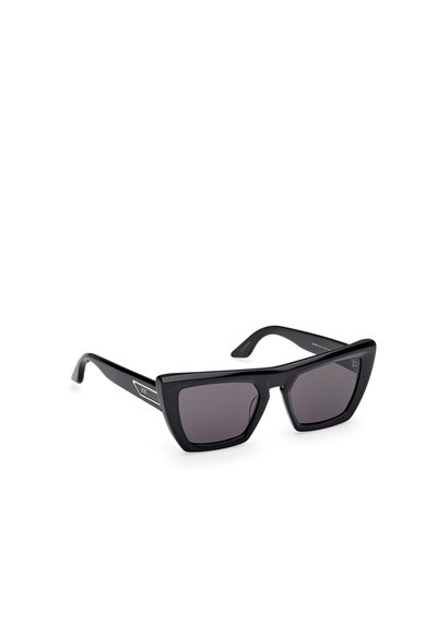 Black plastic sunglasses with angular cat-eye frame, gradient dark lenses, and silver accents on temples. Polished and sleek design.