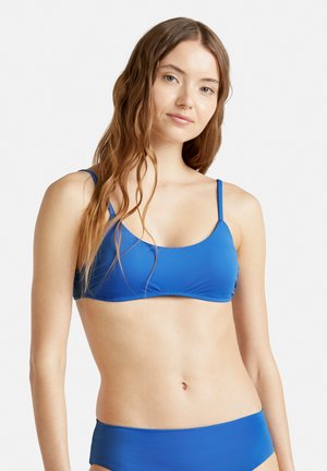 Modrý bikiny top s tenkými ramínky a mírným výstřihem, vyrobený z hladké tkaniny. Doplňkové dno se jednoduchým designem.