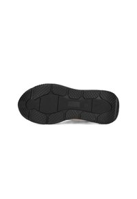 Semelle de chaussure noire en caoutchouc avec surface texturée. Présente un motif hexagonal et des rainures pour l'adhérence. Construction solide, design pratique.