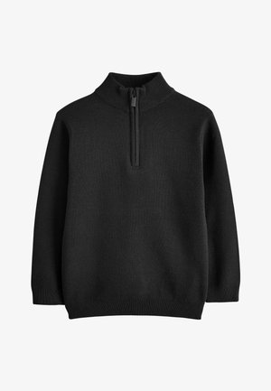 Juodas ilgomis rankovėmis megztas megztinis su ribotu aukštu apykakliu ir puse užtrauktuko priekyje centre.