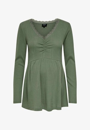 Langärmliges Umstandstop in Olivgrün mit einem V-Ausschnitt und Spitzenbesatz, gerafftem Detail an der Brust und lässiger Passform. Strukturierte Rippware.