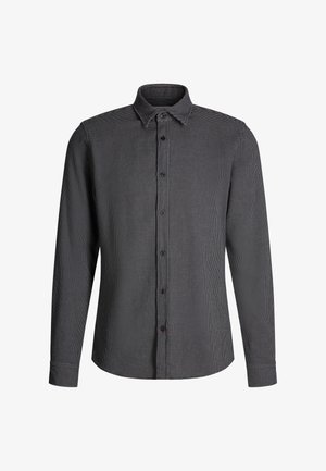 Koszula z długim rękawem w czarno-białą kratę, z klasycznym kołnierzykiem i zapięciem na guziki z przodu.