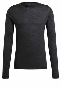 Czarny longsleeve z długim rękawem, wykonany z miękkiej tkaniny, z okrągłym dekoltem, charakteryzujący się subtelną fakturą i dopasowanym krojem. Brak dodatkowych akcentów lub wzorów.