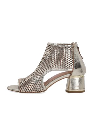 Metallic open-toe heeled sandal with perforated design, side cutouts, and a block heel. Textured surface and zip back closure.