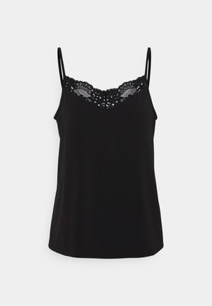 Černý top na ramínka s tenkými popruhy a zubatým krajkovým výstřihem. Vyrobeno z měkkého materiálu s hladkou texturou, má volný střih.