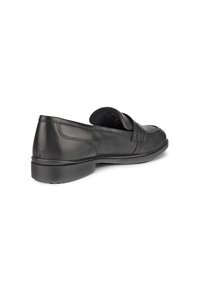 Svart läder slip-on sko med rund tå, låg klack och sydda detaljer längs sidorna. Slät textur och minimalistisk design.