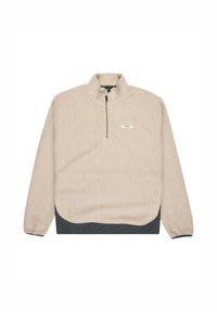 Beżowy pulower z półžitą kieszenią z sztucznego futra, z kontrastowym ciemnoszarym wykończeniem i zamkiem, z małą metką na klatce piersiowej. Miękka, strukturze tkanina.