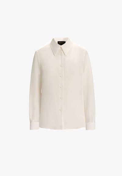 White long-sleeve blouse with a pointed collar, eight button closure, and buttoned cuffs, made from a smooth, lightweight fabric.