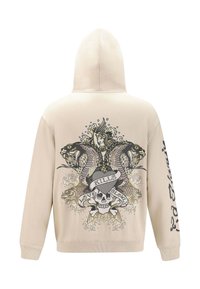 Sudadera beige con un acabado texturizado, que presenta un gráfico detallado de dos serpientes, una calavera y una figura, junto con el texto "EL AMOR MATA LENTAMENTE."