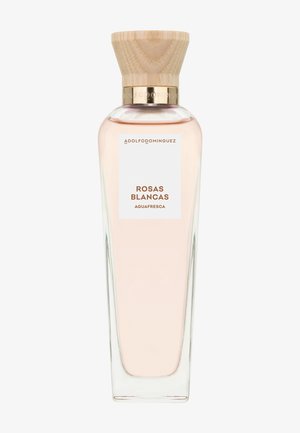 Flacon de parfum en verre avec un liquide rose clair, bouchon en bois et étiquette portant la mention « Adolfo Dominguez Rosas Blancas Aguafresca ».