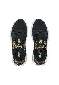 Black sneakers with gold accents, mesh and synthetic upper, lace closure, bold branding on heel, and a white rubber sole.