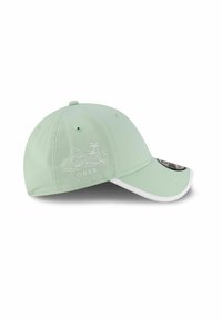 Light green cap with a curved bill, featuring white stitching and a graphic of waves and a palm tree on one side. White underside of the bill.