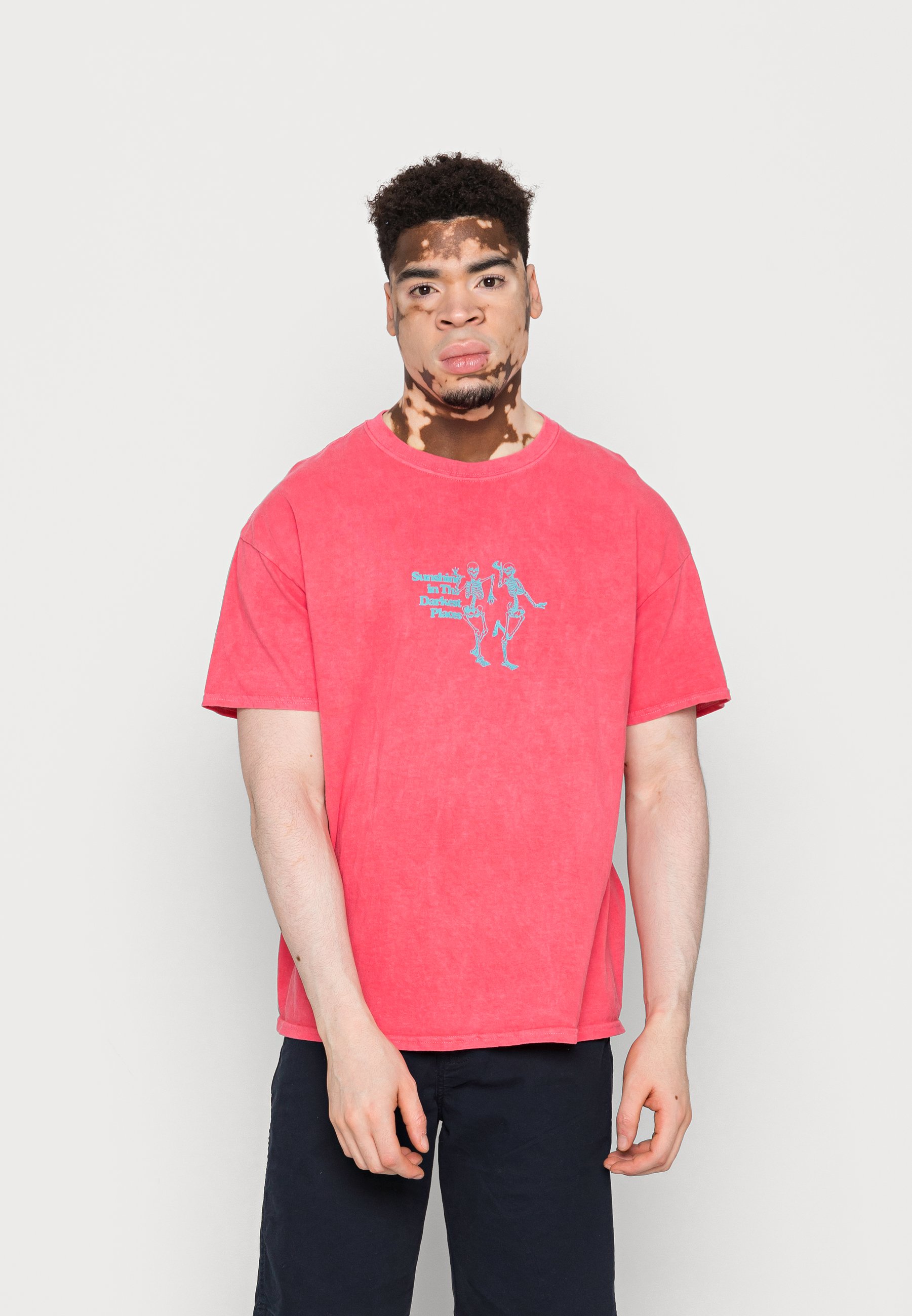 urban outfitters pink skeleton shirt