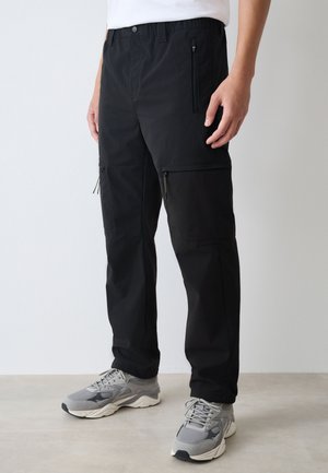 Next, Pantalones cargo - black