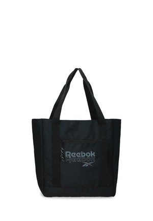 Bolsa tote negra de Reebok con doble asa para el hombro y bolsillo frontal con cremallera que muestra el logo de Reebok en letras grises.