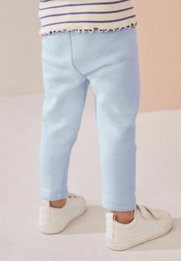 Next COSY LINED - REGULAR FIT - Leggingek - Nadrágok - pale blue
