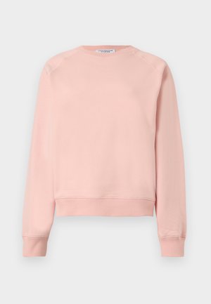 Šviesiai rožinis ilgomis rankovėmis megztinis su apvalia iškirpte, su raštuotais rankogaliais ir apačia, vientiso dizaino, pateiktas ant balto fono.