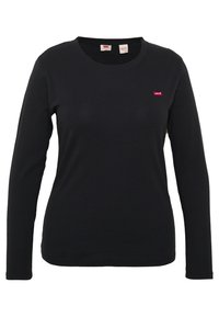 Schwarzes Langarm-T-Shirt aus Baumwolle. Verfügt über einen runden Hals und ein kleines rotes Levi's-Logo auf der Brust. Weiches Material, taillierte Passform.