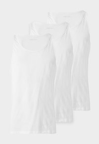 Three plain white sleeveless undershirts stacked side by side with round necklines on a light background.