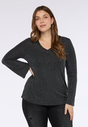 - Bluzka z długim rękawem