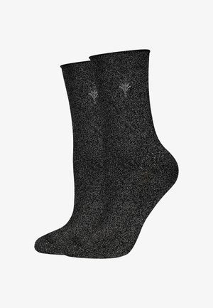 Schwarze Socken mit einer metallischen Oberfläche, die ein dezent eingesticktes Blumenmuster am Bund aufweisen. Glattes Material, Länge bis zur Mitte der Waden.