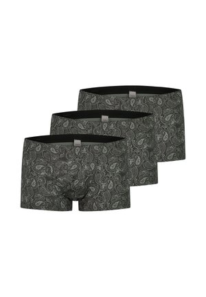 Trzy pary czarnych bokserek z białym wzorem paisley ułożone w przesuniętym rzędzie na białym tle.