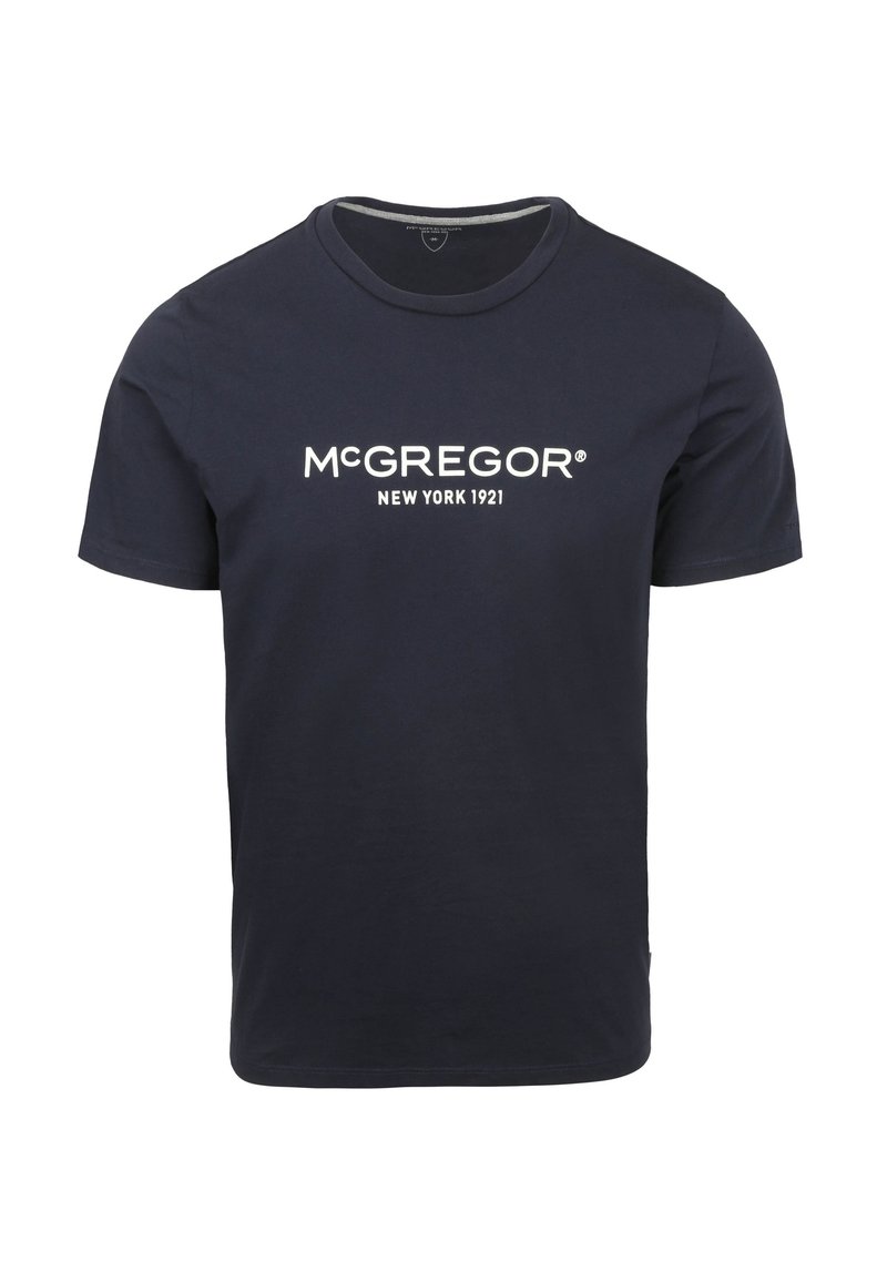 Marineblauwe katoenen t-shirt met korte mouwen en ronde hals. Heeft een witte logo "McGREGOR NEW YORK 1921" gedrukt over de borst.