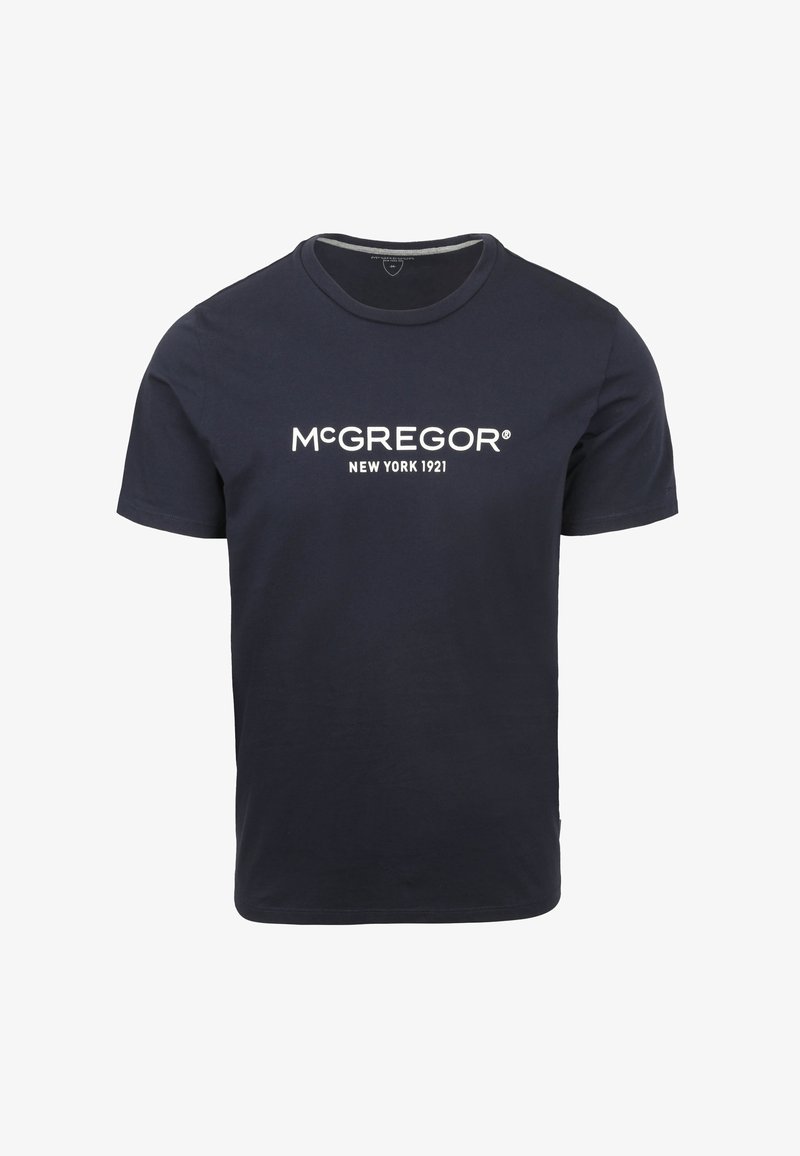 Marineblauwe katoenen t-shirt met korte mouwen en ronde hals. Heeft een witte logo "McGREGOR NEW YORK 1921" gedrukt over de borst.