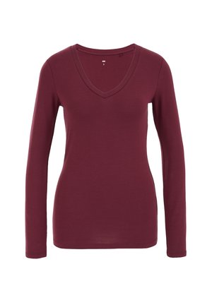 Dolga majica z V-izrezom v burgundski barvi iz mešanice bombaža. Ima prilega obliko z minimalnimi šivi in gladko teksturo. Velikost S.