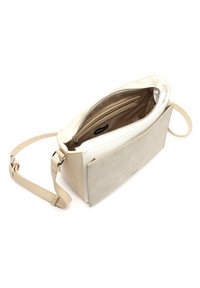 Borsa a tracolla in pelle beige con una parte superiore a trama crema, chiusura con zip e tasche interne. Tracolla regolabile per versatilità.
