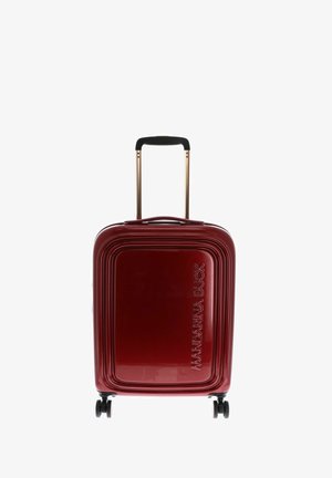 Red hard-shell suitcase with a linear design, featuring a gold retractable handle and four black wheels. Logo embossed on the front.