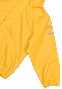 Yellow waterproof jacket with a smooth texture. Features a snap closure and elasticized cuffs. Gray logo accent on the left arm.