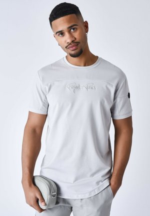 TECHNIQUE À DÉCOUPES - Camiseta estampada - light stone