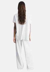Mango ANNE-A - Pantaloni - white
