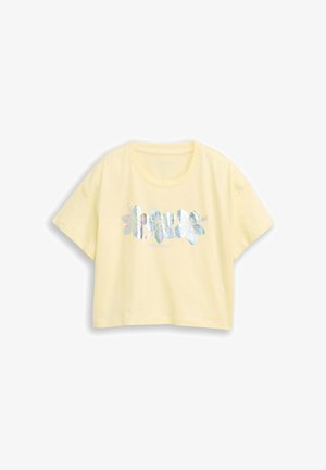 T-shirt corta a manica corta giallo chiaro con grafica floreale iridescente sul petto e scollo rotondo.