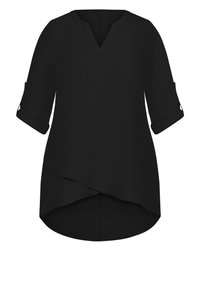 Blouse noire avec un col en V, manches trois-quarts et poignets retroussés. Caractérisée par un ourlet asymétrique et un tissu lisse et léger.