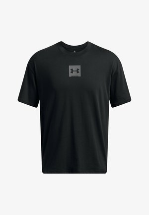 Schwarzes T-Shirt mit kurzen Ärmeln aus Baumwolle. Verfügt über ein grafisches Logo in einem Quadrat auf der Brust. Einfaches und gerades Schnittdesign.