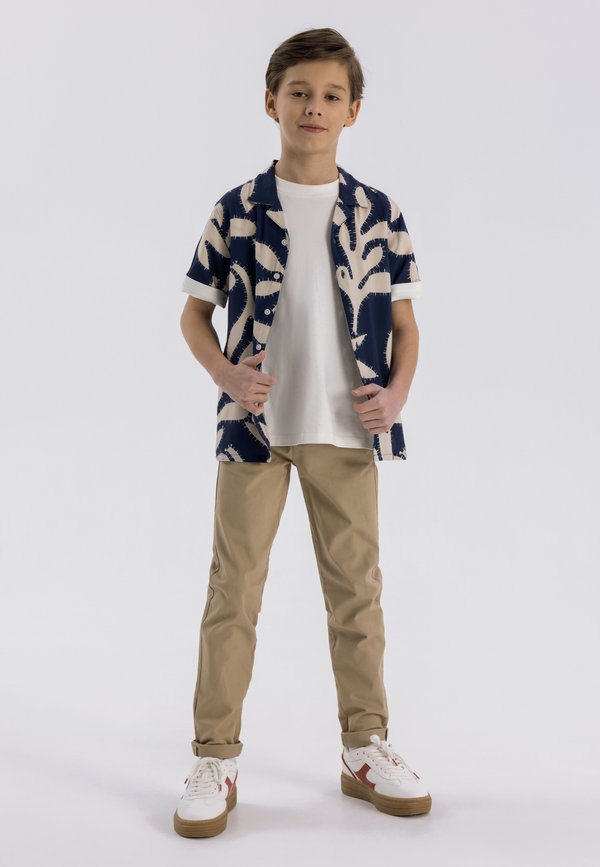 TAPERED LEG AND SLIM FIT - Chino - beige