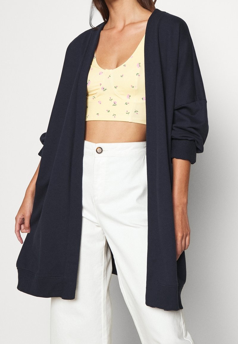Monki Vetoketjullinen college - dark blue