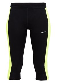Czarne, krótkie legginsy sportowe z neonowo-żółtymi panelami bocznymi oraz małym, szarym logo Nike na prawej udzie.