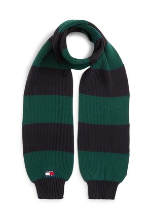 Lang strikket halstørklæde med brede vandrette grønne og mørkegrå striber og et lille Tommy Jeans logo-patch i den ene ende.