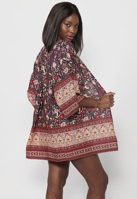 Koroshi Veste légère - red