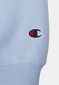 Champion CREW NECK UNISEX - Sweatshirt - light blue